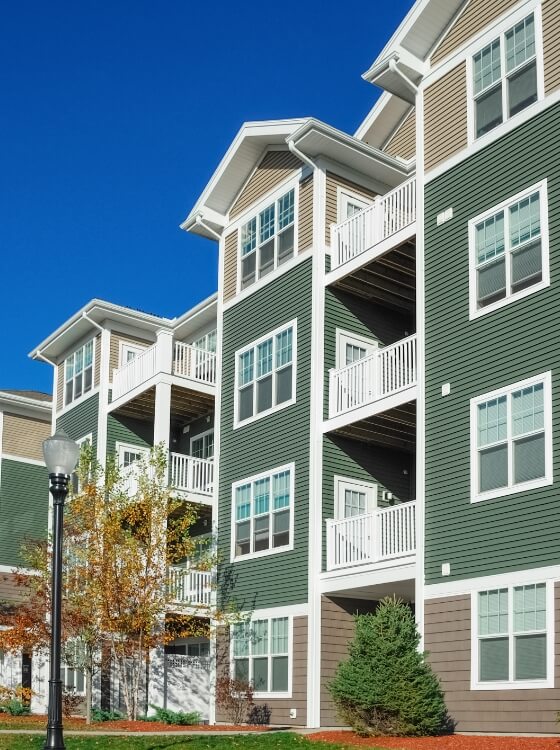 Modern apartment building with glass balconies