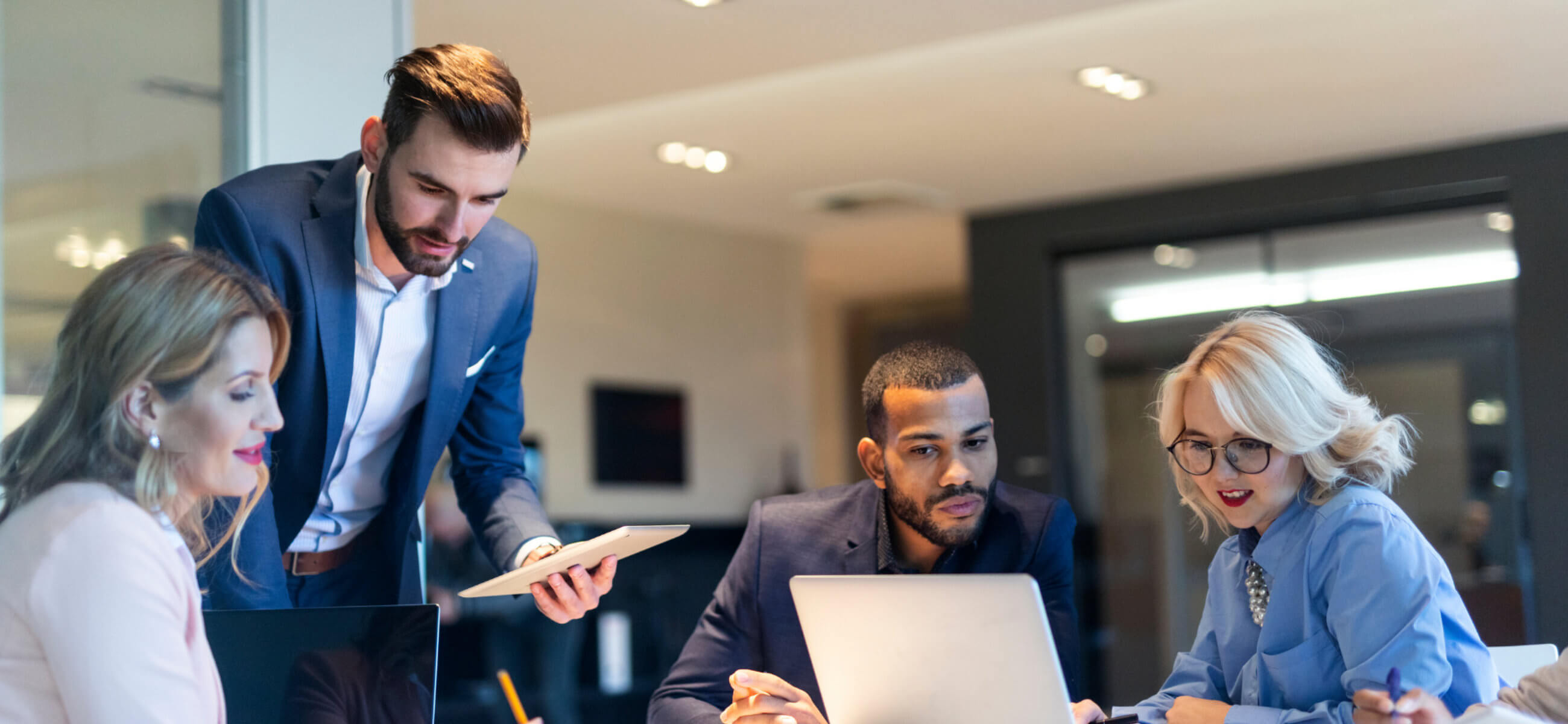 ONYX Multifamily Group team reviewing business strategy