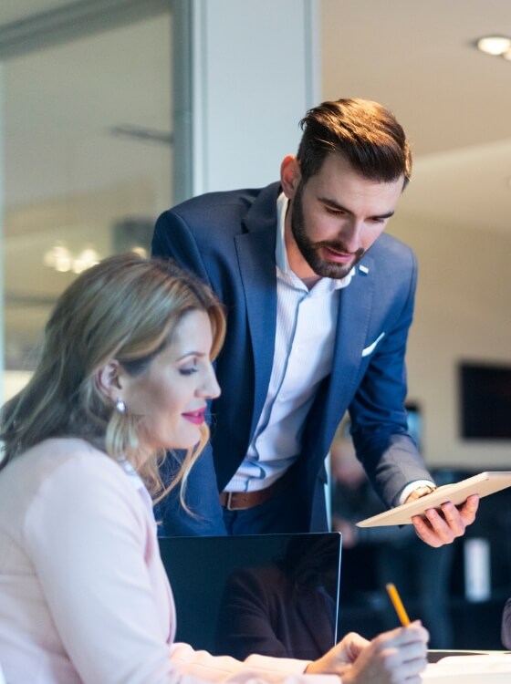 ONYX Multifamily Group team reviewing a business document